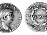 a silver coin with an image of a man on it