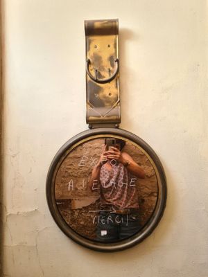 a picture of a man taking a picture of himself in a mirror