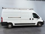 a picture of a white van parked in a garage