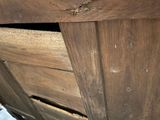 a close up of a piece of wood that has been damaged