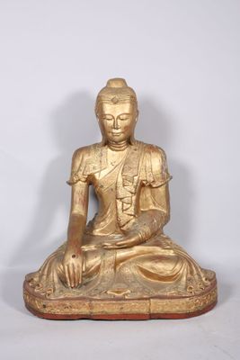statue of a seated buddha on a white background