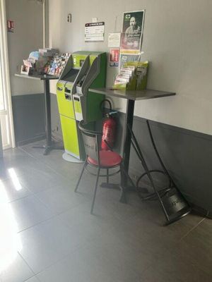 two tables that are sitting next to each other in a room