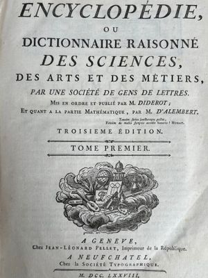 an old book with a black and white image of a man on a horse