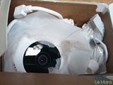 a box with a camera inside of it that is in a box