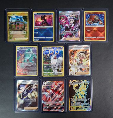 beaucoup de cartes pokemon sur la table