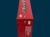 a box of legos sitting on a blue surface