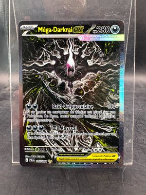 a close up of a card in a clear box on a table