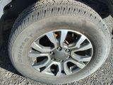 a close up of a tire on a car