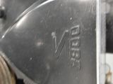 a close up of a metal object with a metal handle