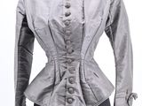 an image of a woman ' s jacket on a mannequin
