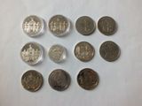 a close up of a bunch of coins sitting on top of a table