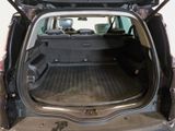 the back of a car with the trunk open showing the cargo area