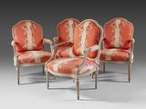 three chairs with a red upholstered back and a pink upholstered back