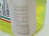 a close up of a bottle of liquid with a barcode on it