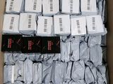 a box full of boxes of white and black items