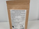 the back of a brown bag of tea sitting on top of a white table