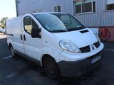 a white van that is parked in a parking lot