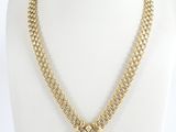 l'image d'un collier en or orné d'une croix