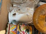 a box full of glass and other items that are in it