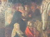 une image d'une peinture représentant un groupe de personnes dans une grotte