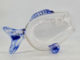 a glass fish figurine with a blue and white design