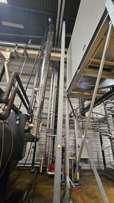 a large machine that is sitting inside of a building