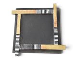 a picture of a black and white picture frame on the wall