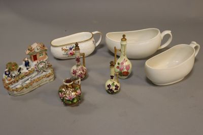 many different pieces of porcelain on the table