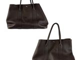 a pair of brown leather bags sitting on top of each other