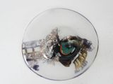 a glass plate with a picture of a clock on it