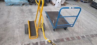 a yellow hand truck with a blue hand truck on it