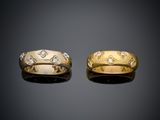 two gold and diamond wedding bands