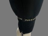 an image of a mannequin wearing a black jacket and pants