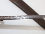 a close up of a pair of scissors on a table