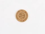 an image of a gold coin on a white surface