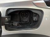 a close up of a car ' s interior with the door open