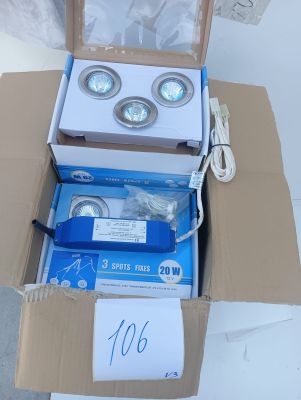 a box with three lights inside of it on a table