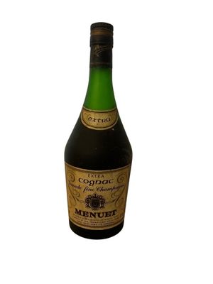 an image of a bottle of wine sitting on top of a table