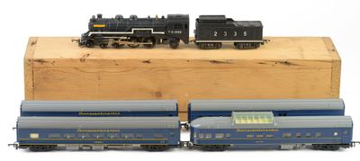 two toy trains that are sitting on top of a wooden box