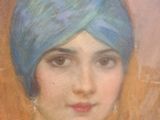 painting of a woman with a blue turban in a gold frame