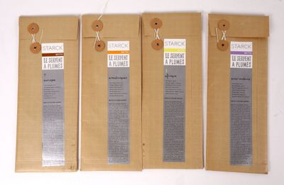 three bags of coffee sit on top of a white table