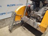 an image of a machine that is parked in a garage