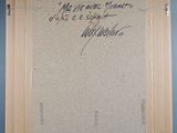an old picture of a picture with writing on it in a room