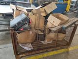 many boxes and boxes in a metal cage in a warehouse