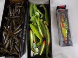 many different types of fishing lures in a box