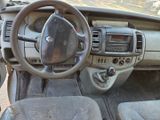 a dashboard of a car with a steering wheel and dashboard controls