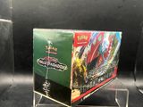 a close up of a box of pokemon trading cards on a stand