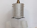 a light that is hanging from the ceiling in the room