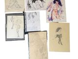 many sketches of a woman and a man on a sheet of paper
