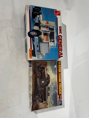 two boxes of toys on the wall of a room